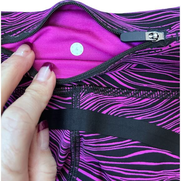 LULULEMON On Track Crop Life Lines Polar Pink & Black Reflective 21” Size 4 NWOT - Picture 8 of 10